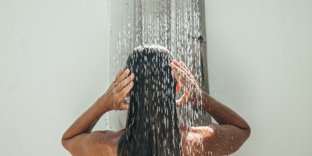 A Dermatologist Says This Common Shower Mistake Can Cause Body Acne