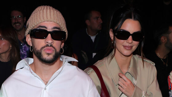 Kendall Jenner cuddles up to boyfriend Bad Bunny as she goes pantless under just a trenchcoat at Gucci show in Milan