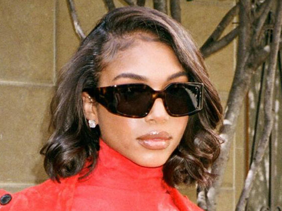 Lori Harvey flaunts her tiny waist in skintight red outfit for sultry pics in Milan as mom Marjorie joins the comments