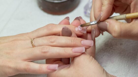 Doctor warns women against cheap acrylic fake nails - says they can lead to a nasty infection that turns your nails GREEN
