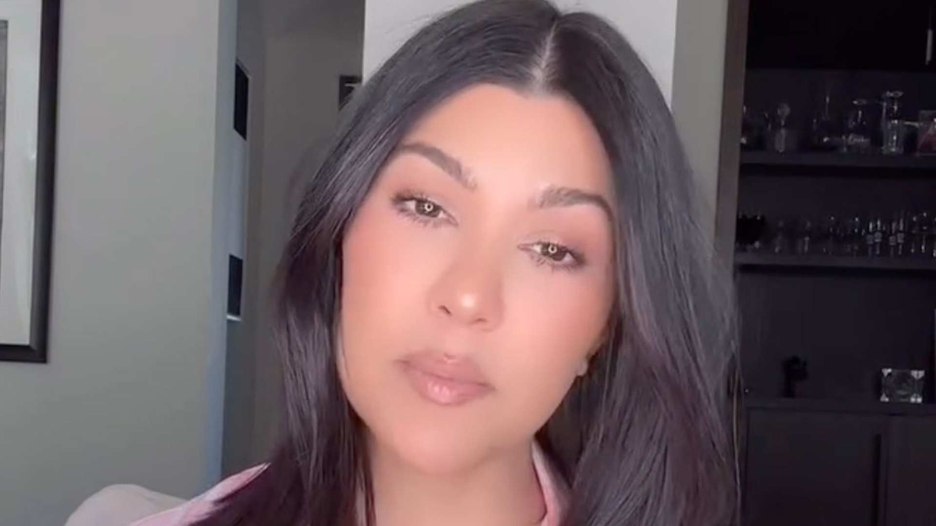 Kourtney Kardashian reveals post-baby body in a pink silk top as she promotes new Lemme product at $9M Calabasas home