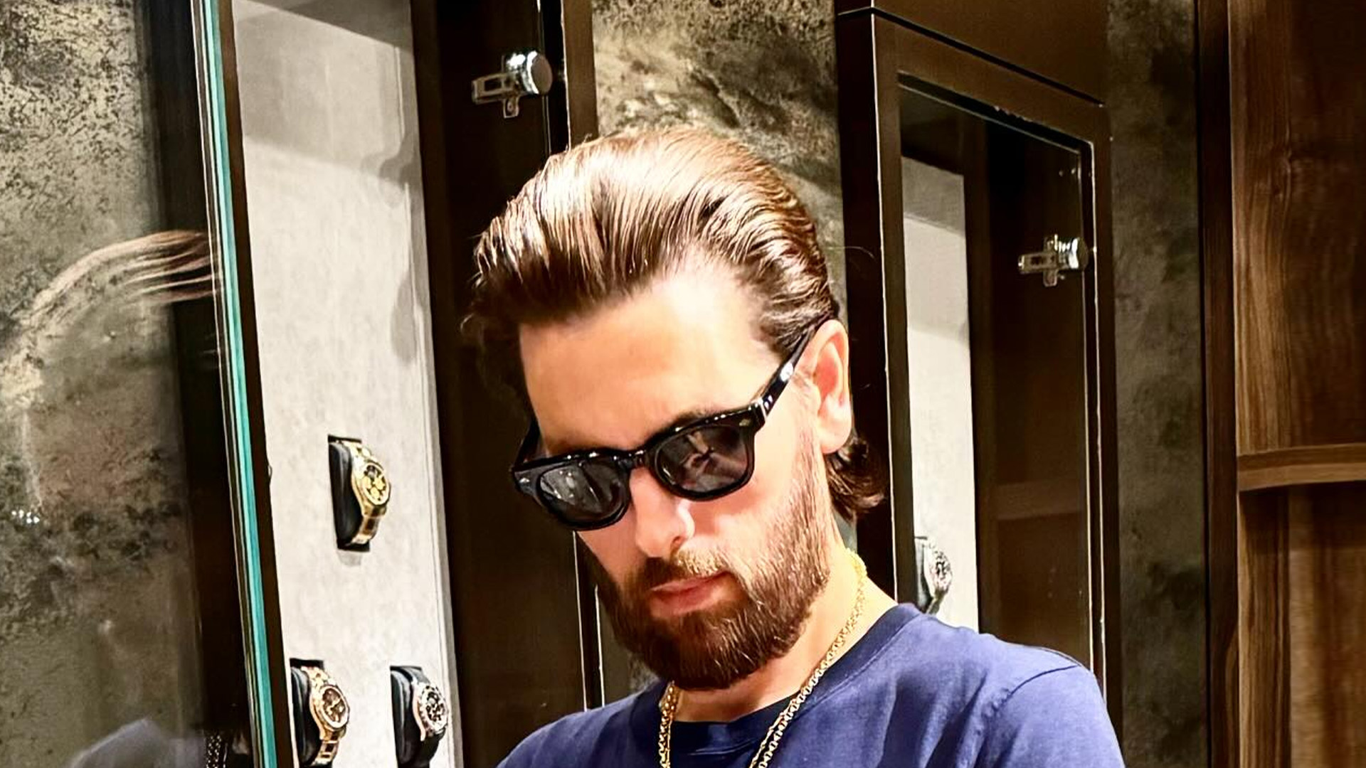 Scott Disick sparks concern as his pin-thin figure drowns in baggy pants during backyard ride with son Reign, 9