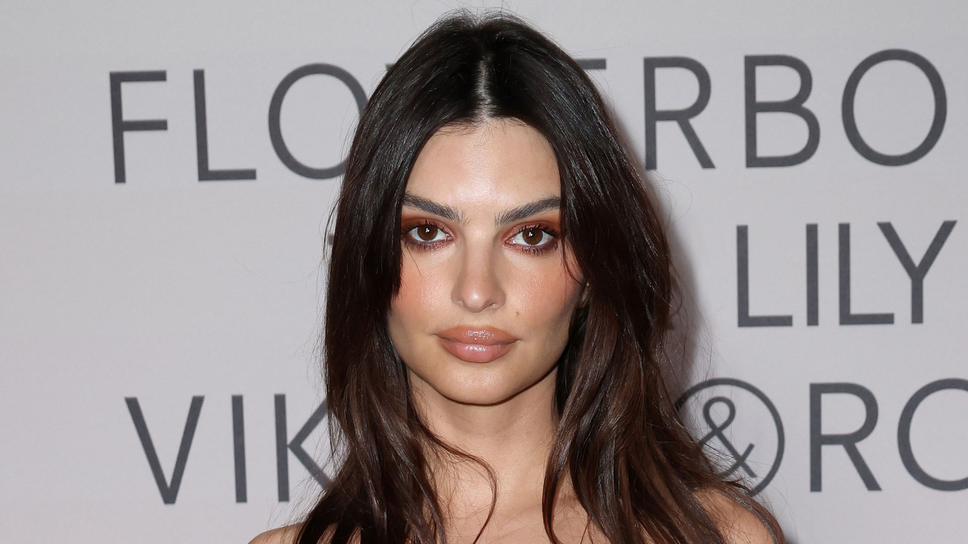 Emily Ratajkowski slams trolls calling her a ‘bimbo’ for ‘showing cleavage’ as she rocks plunging top at NYC home