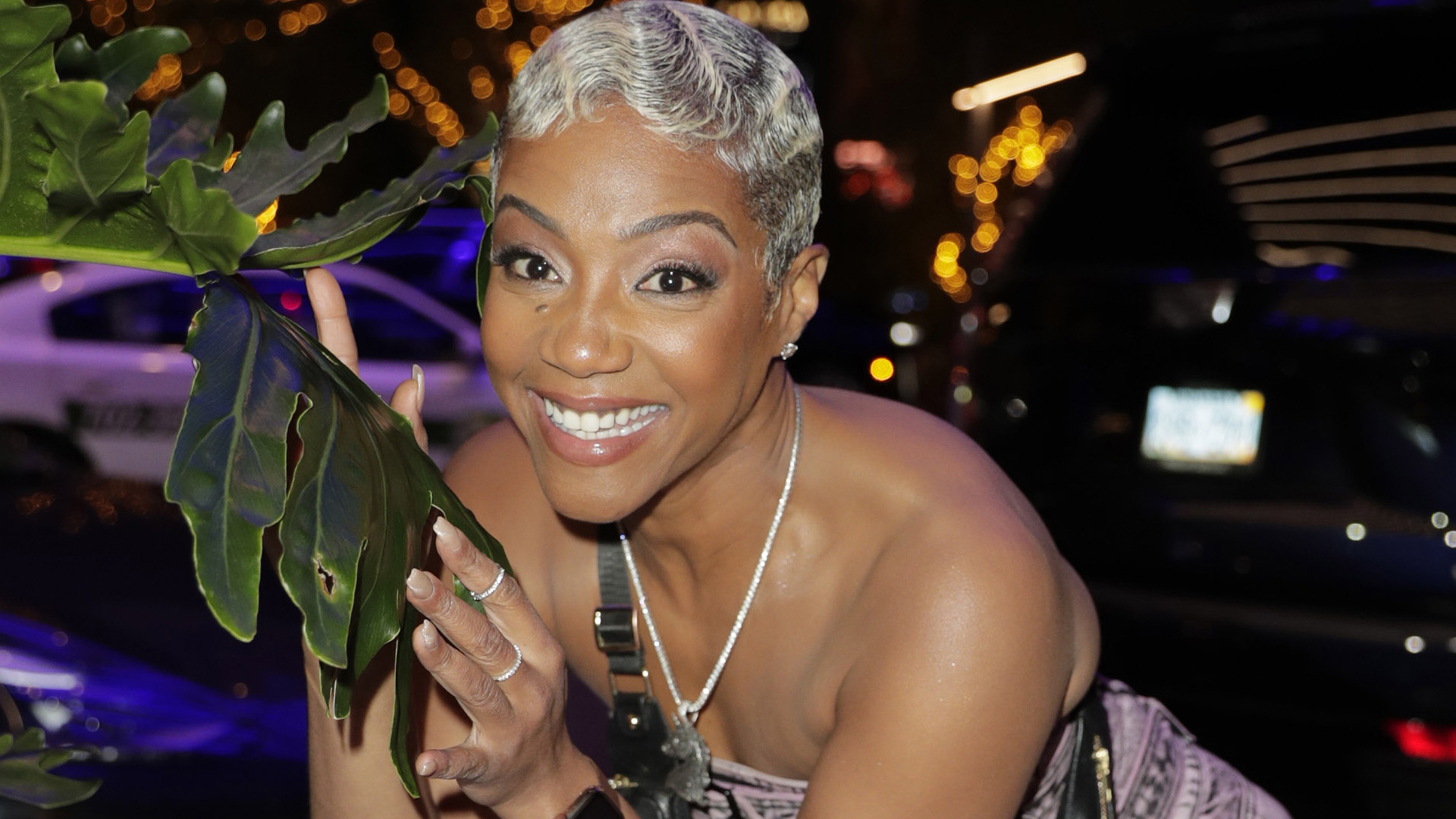 Glam Tiffany Haddish goofs around with handsome mystery man in wild new pics and parties at $3.7b hotel for Super Bowl