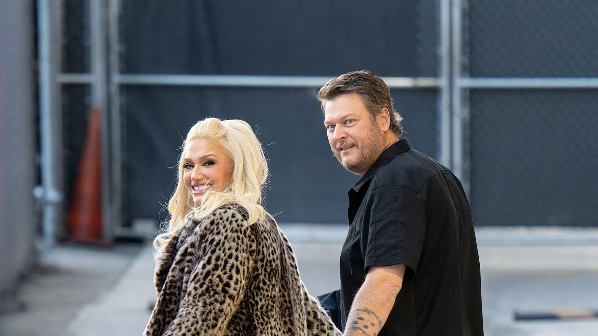 Gwen Stefani holds Blake Shelton’s hand in blink-and-you’ll-miss it moment after fans think couple has ‘marriage issues’