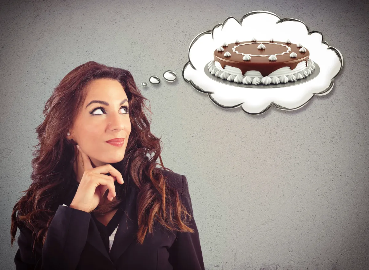 woman thinking of cake, concept of food noise