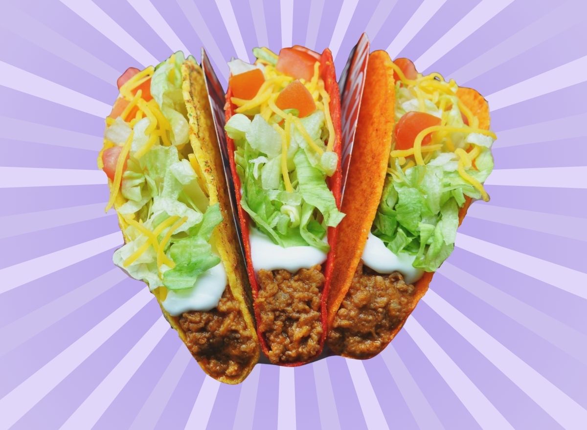 A trio of Taco Bell tacos against a colorful background