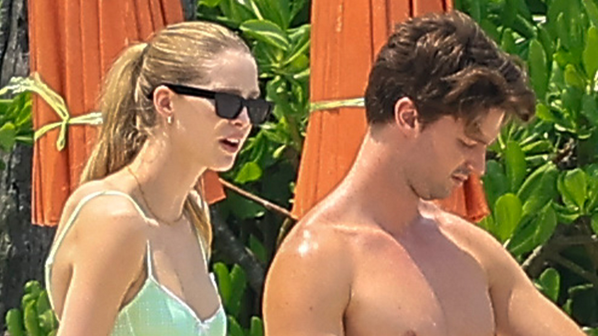 Patrick Schwarzenegger hits beach with bikini-clad fiancée Abby Champion while filming in Thailand for The White Lotus