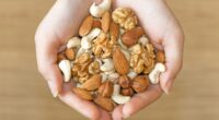 Eat nuts and seeds to fight off disease: Healthy snacks should be added to 5-a-day guidance to boost nation's health, report suggests