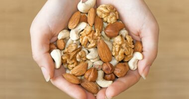 Eat nuts and seeds to fight off disease: Healthy snacks should be added to 5-a-day guidance to boost nation's health, report suggests