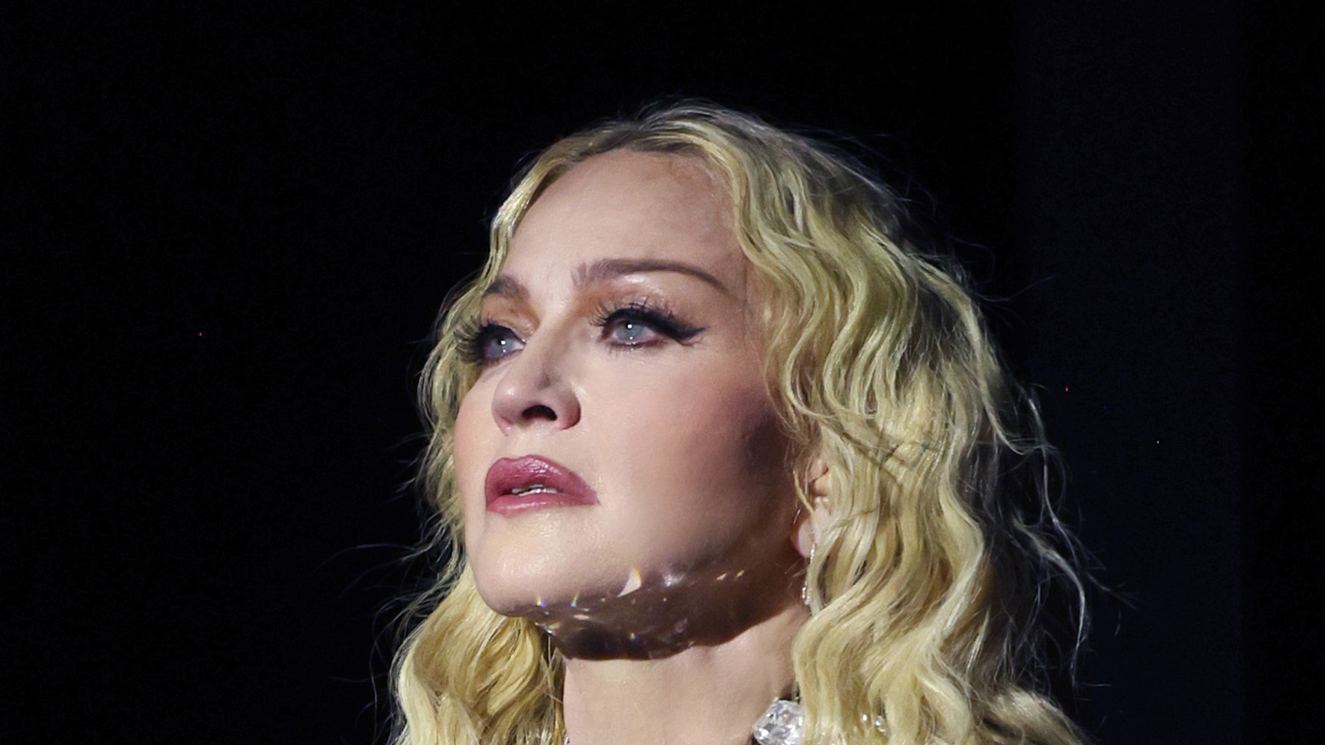 Madonna, 65, drops new selfies in plunging top after Miami concert as fans gush singer ‘doesn’t look a day over 30’