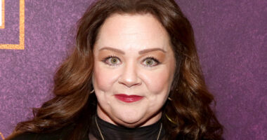 Melissa McCarthy poses in a sheer black top and matching pants for NYC event after weight-loss transformation