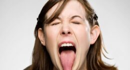 The red flag warning signs on your tongue that should trigger 'alarm bells'