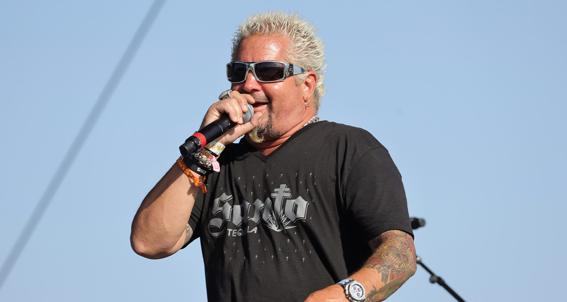 Guy Fieri reveals slimmed-down body after weight loss as Food Network fans say he ‘looks incredible’ with Gordon Ramsay