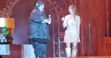 Jelly Roll puts his slimmed-down figure on display while performing with Lana Del Ray at Hangout Fest after weight loss