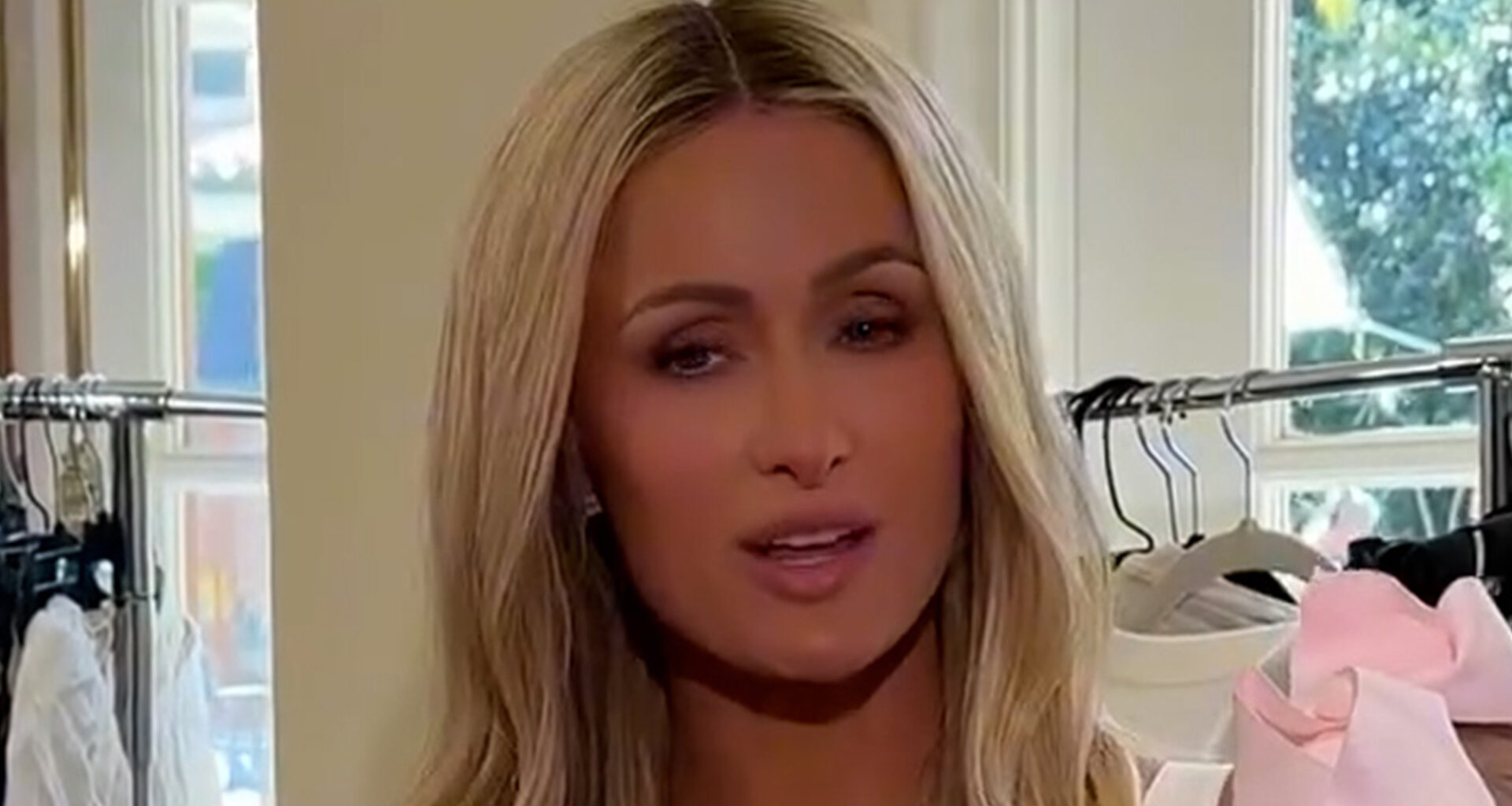 Paris Hilton holds ‘so pale’ daughter London and questions if babies can get spray tans as fans joke ‘mom of the year’