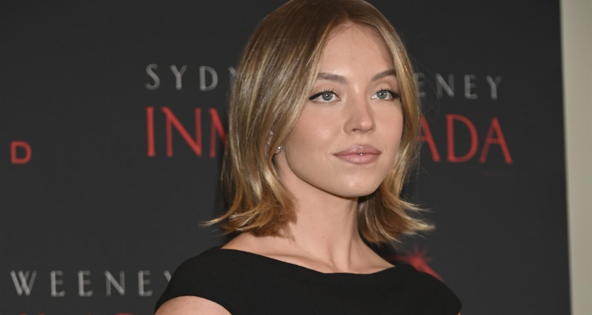 Sydney Sweeney takes wardrobe risk while posing in skintight black dress with cut-outs in Mexico