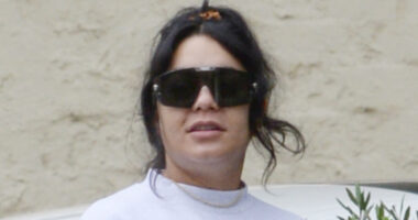 Vanessa Hudgens’ growing baby bump on display as pregnant star wears white crop top and sweats during walk in LA