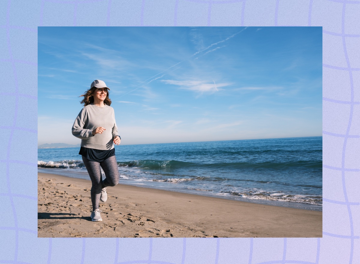 middle-aged woman running on the beach