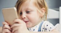 Children handed smartphones to calm tantrums don't learn how to control their emotions, new research shows