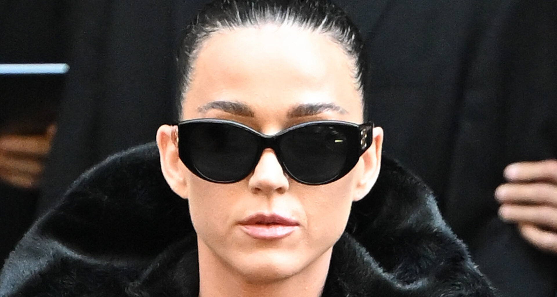 Katy Perry goes topless under black fur coat as she flashes rock hard abs at Balenciaga show