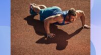 fit, muscular man doing pushups outdoors