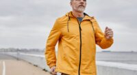 mature man walking outdoors, concept of fitness tips to prevent bone loss