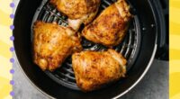 four chicken thighs in an air fryer