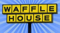 The iconic yellow sign f a Waffle House restaurant set against a vibrant blue background