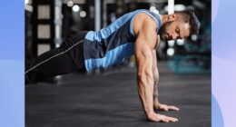 fit, muscular man doing pushups at the gym