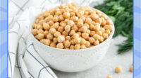 bowl of cooked chickpeas with a blue border