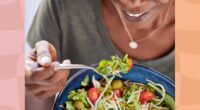 close-up of woman eating salad