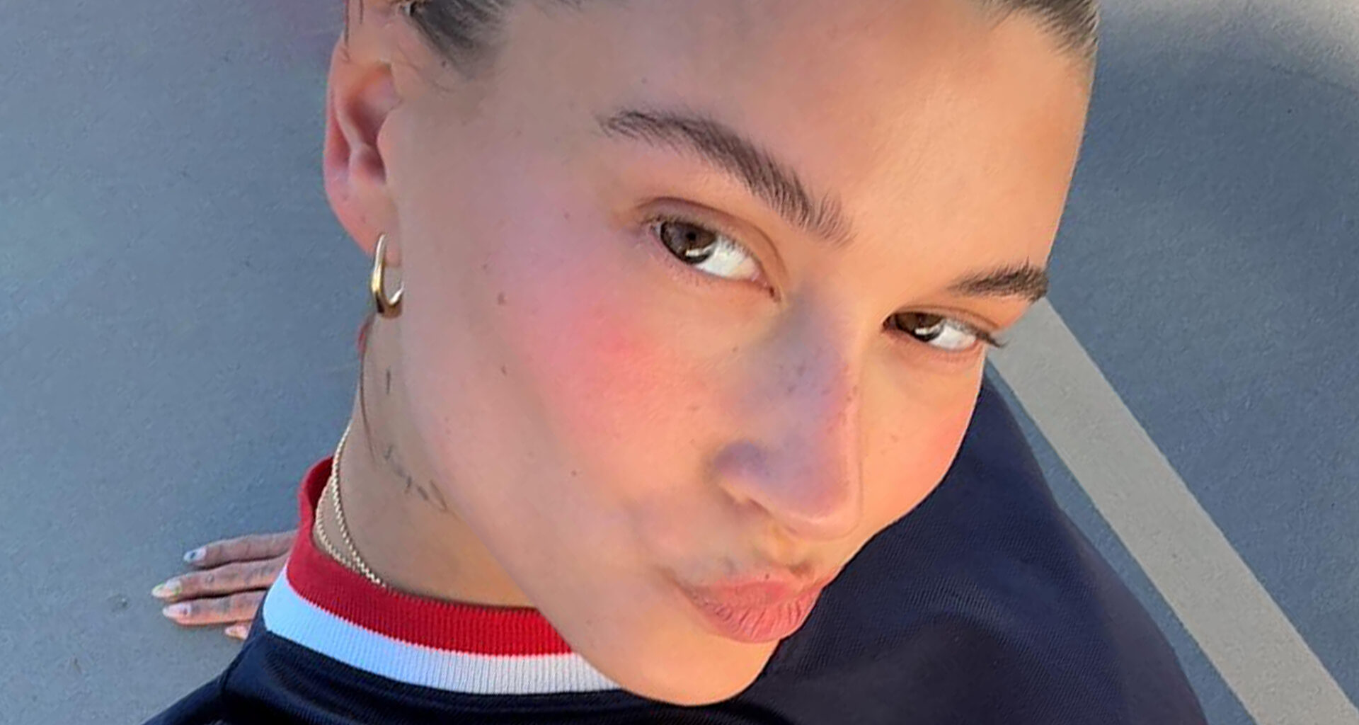 Hailey Bieber’s bare baby bump pokes out of crop top in new photo as fans ask ‘where’s Justin’ as he’s ‘always absent’
