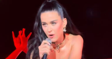 Katy Perry wears silver corset and dog collar at Italy show as fans ask of ageless star ‘how old is she again?’