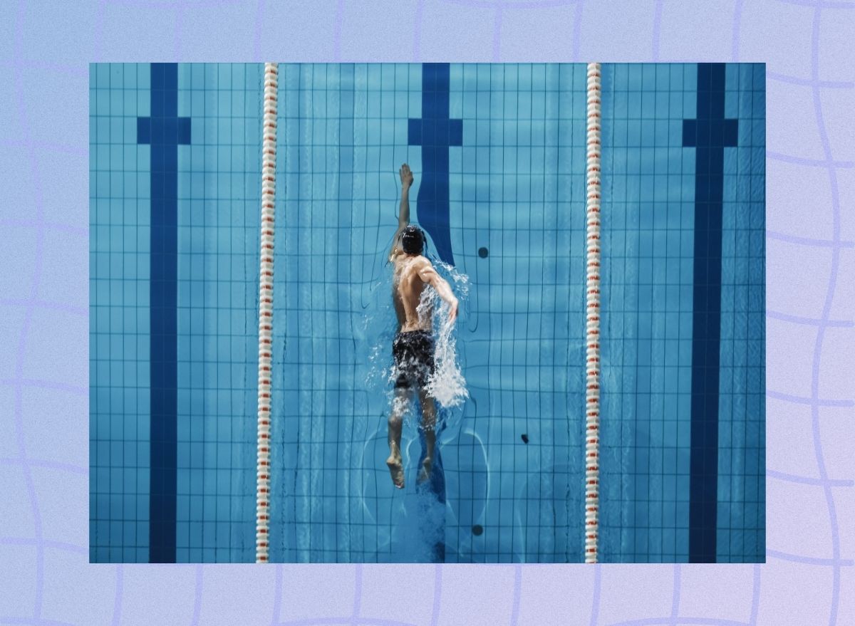 a photo of a man swimming laps in a pool on a designed bluish background