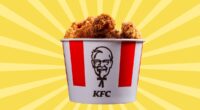 a bucket of Kentucky Fried Chicken on a designed yellow background