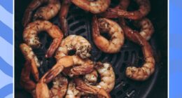 cooked shrimp inside an air fryer