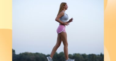 woman doing walking workout outdoors