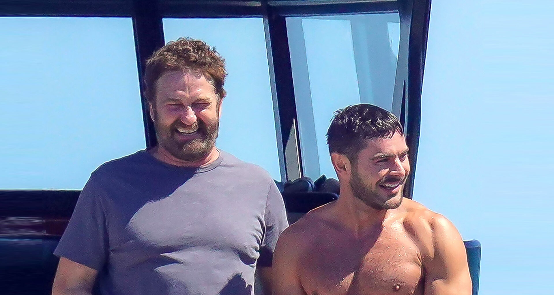 Zac Efron, Gerard Butler and bikini-clad women party on yacht in St Tropez – but fans spot ‘normal’ detail