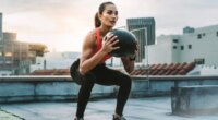 medicine ball squat, concept of weight-training workouts that burn the most calories