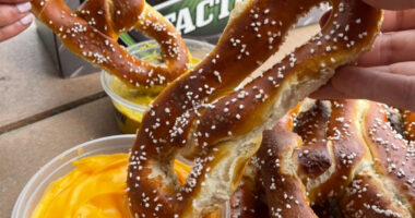 people dipping philly pretzel factory pretzels into dips