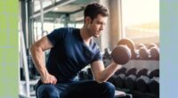 a photo of a man at the gym doing bicep curls with a dumbbell on a designed greenish background