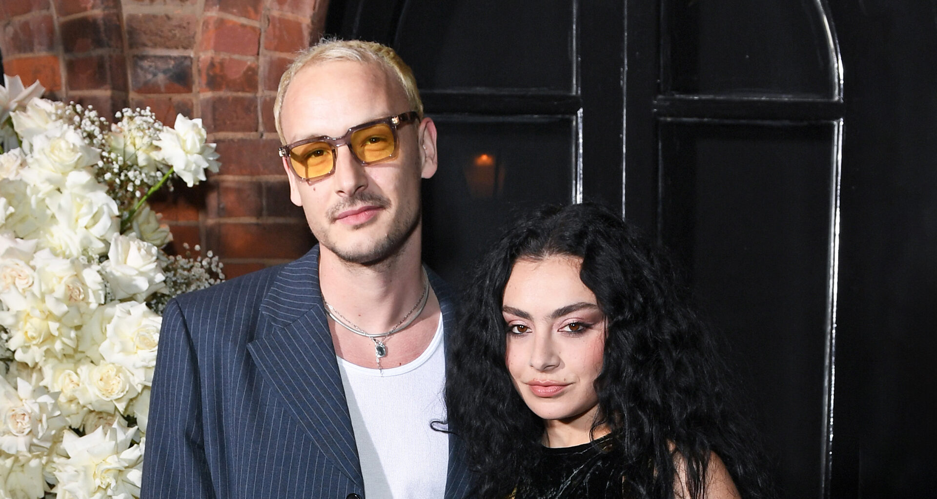 Charli XCX says she’s ‘jealous’ of her 1975 rocker fiancé George Daniel playing ‘bigger’ shows than her in rare comments