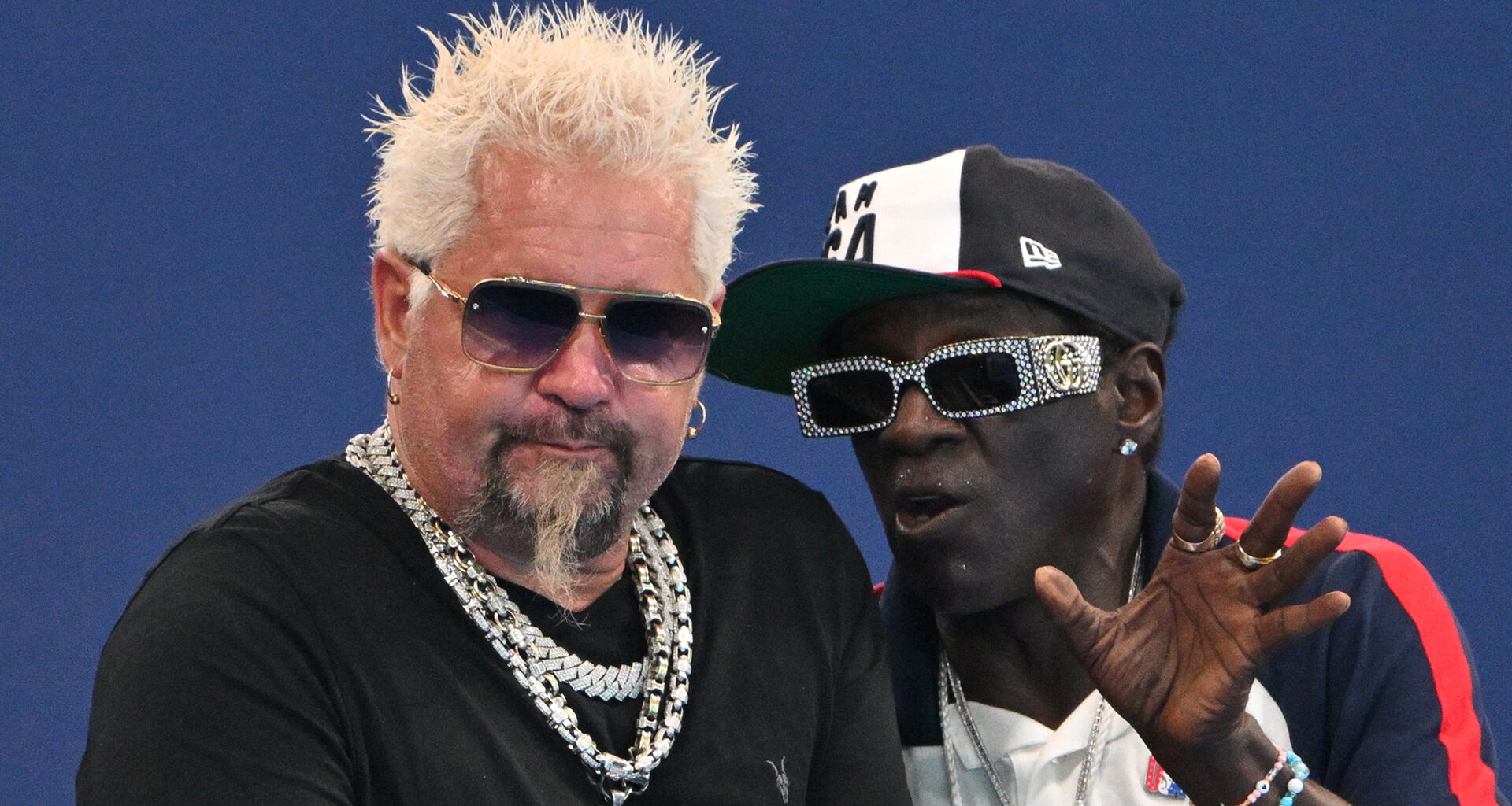 Food Network star Guy Fieri reveals slimmed-down body after weight loss during Paris outing with rapper Flavor Flav