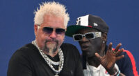 Food Network star Guy Fieri reveals slimmed-down body after weight loss during Paris outing with rapper Flavor Flav