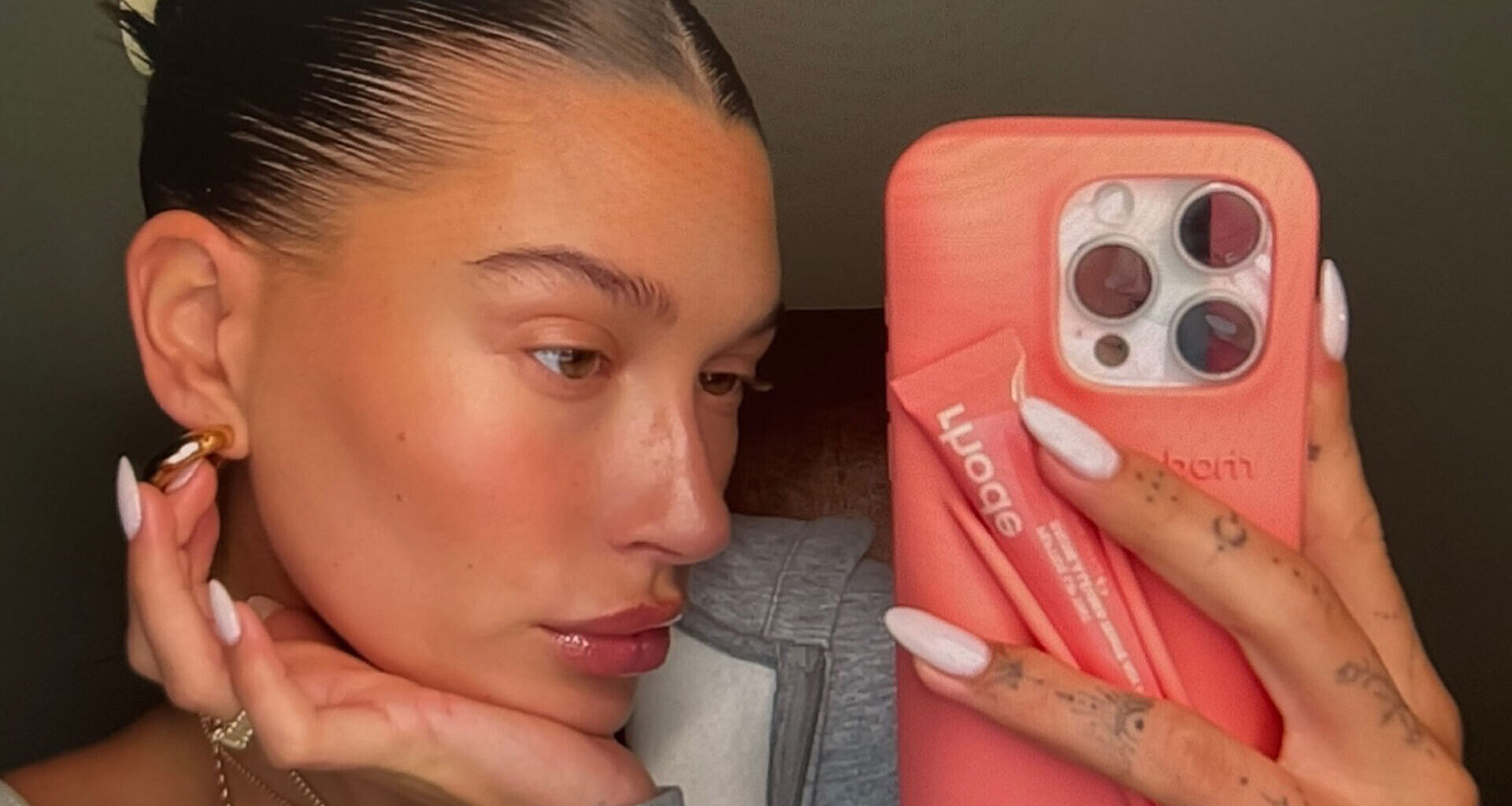 Hailey Bieber posts throwback Rhode selfie weeks after sharing new photo as fans think she’s welcomed baby with Justin