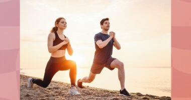 fit couple doing walking lunges on the beach at sunset