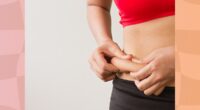 close-up of woman grabbing love handle fat