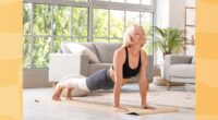 mature woman doing yoga exercise in her bright living space