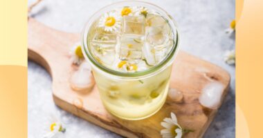 refreshing chamomile mocktail in a glass on a cutting board